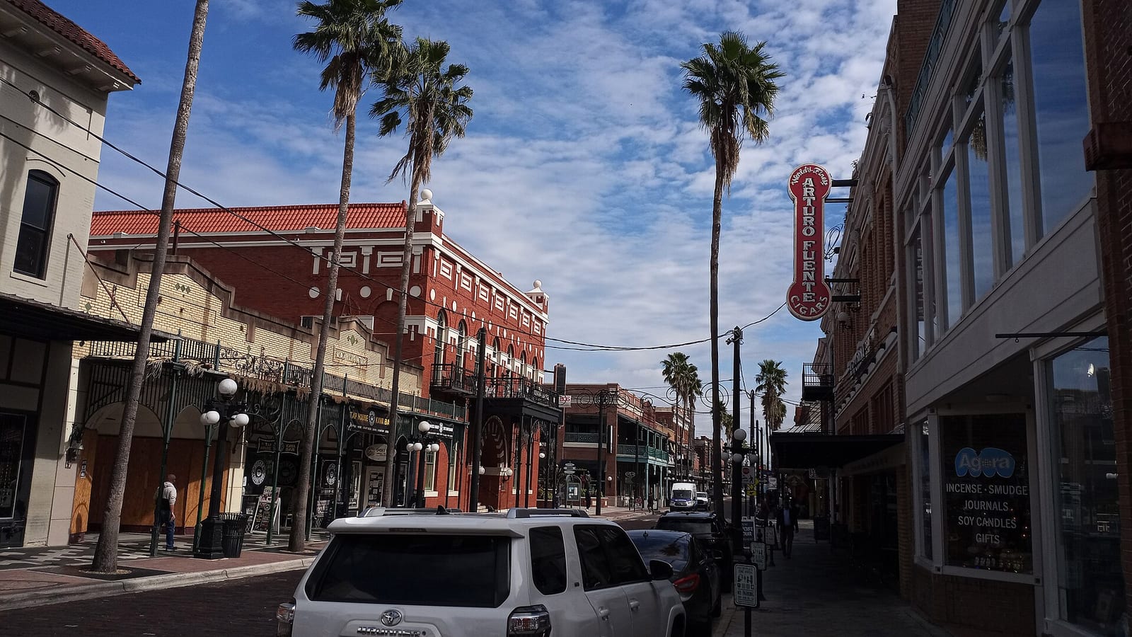 Historic brick buildings and balconies along Seventh Avenue in Ybor City, Tampa, Florida